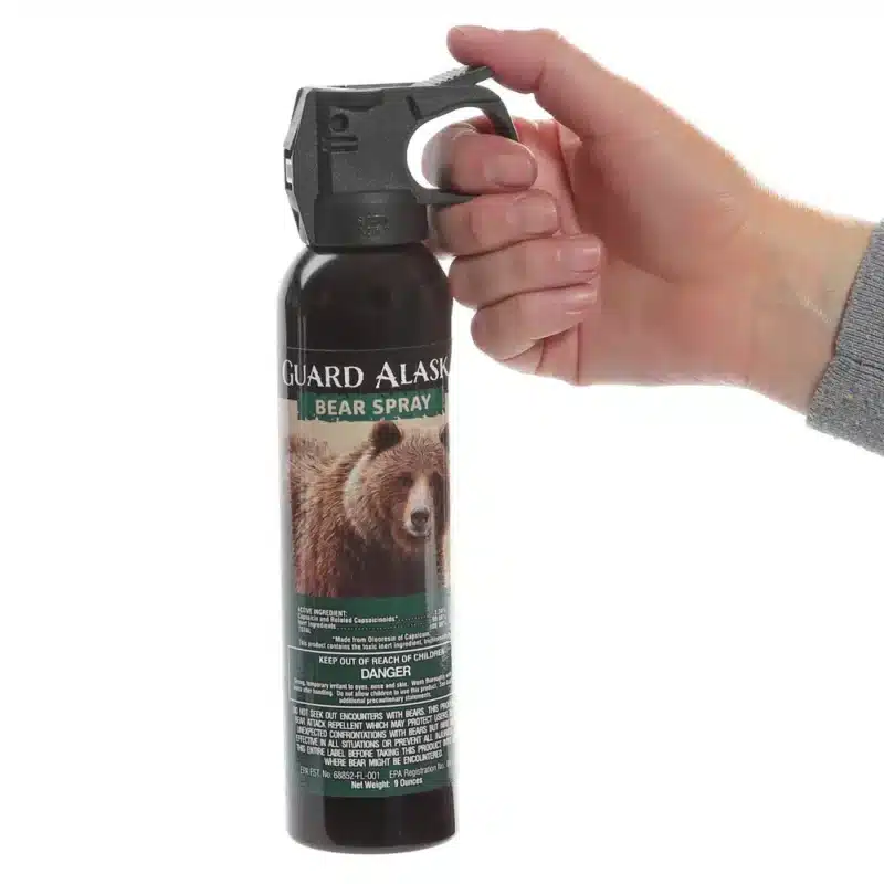 Mace Guard Alaska Bear Spray Guard Alaska Bear Spray - being held to show size