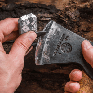 Viking Spark sharpening an axe head